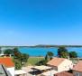 Beautiful apartment with a terrace and a view in a new building 100 meters from the sea in Medulin - pic 12