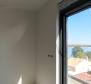 Beautiful apartment with a terrace and a view in a new building 100 meters from the sea in Medulin - pic 15