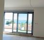 Beautiful apartment with a terrace and a view in a new building 100 meters from the sea in Medulin - pic 21