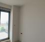 Beautiful apartment with a terrace and a view in a new building 100 meters from the sea in Medulin - pic 22