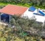Detached house in Starigrad area on Hvar island with an olive field  