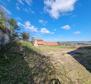 Fantastic estate in Buzet with 4 residential buildings and one business-residential building, open view of nature and the lake - pic 55