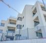 Highest quality apartment of 67m2 in a new building in the center of Opatija with garage, sea view, 200 meters from the beach - pic 11