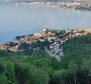 Building plot of 1096m2 with a project for a villa with a panoramic view of the sea for a villa with a swimming pool over Opatija 