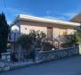 Detached house with two separate apartments, garage and garden in Jadranovo, 270m from the sea, for sale 