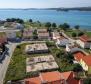 Projet d&#39;investissement - terrain avec permis de construire valide et sous-sol fini à seulement 80 mètres de la mer 