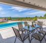 Modern villa with swimming pool just 150 meters from the sea in Medulin 