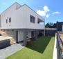 Moderne Familienvilla von 240 m2 auf 1553 m2 Grundstück 