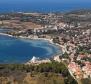 Land plot for sale in Bašanija, Umag, first line to the sea, T3 zoning for camping 