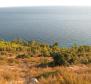Exceptional T2 zoned land by the sea on Hvar 
