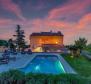 Apartment building of 700m2 with a swimming pool in Lovran + 6000m2 of land with a project for a wellness resort with 28 rooms 