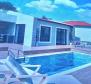 Detached house with swimming pool under construction in Liznjan 